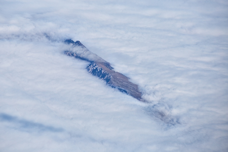Snow on top of the romanian Carpathians mountainsの写真素材