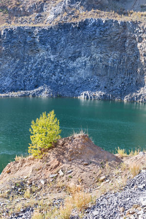Artificial lake in a basalt quarry from Tacos in Transylvania Romaniaの写真素材