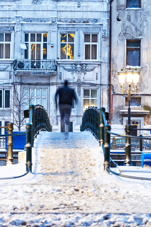 Bucharest pedestrian bridge over Dambovita river during winterの写真素材