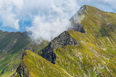 Tourists on Fagars mountains in Romania during summerの写真素材