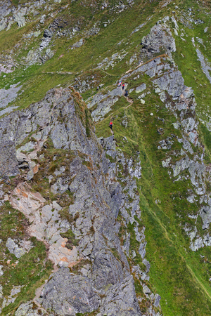 Tourists on Fagars mountains in Romania during summerの写真素材