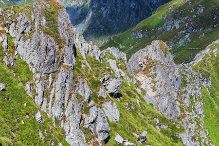 Tourists on Fagars mountains in Romania during summerの写真素材