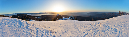 Winter panorama with Fagaras mountains and Olt river, view from Cozia mountain in Romaniaの写真素材
