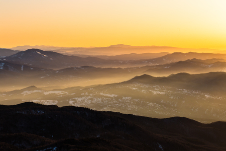 Carpathians mountains range covered by sunrise sunの写真素材