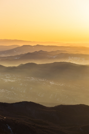 Carpathians mountains range covered by sunrise sunの写真素材