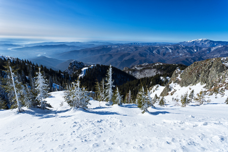 Olt river and Buila Vanturarita mountain panoramic view from Cozia peakの写真素材
