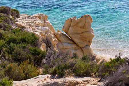 Exotic Platanitsi beach in Sarti, Sithonia, Greece with crystal clear water and spectacular shapes of rocksの写真素材