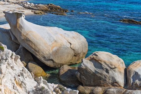 Exotic Platanitsi beach in Sarti, Sithonia, Greece with crystal clear water and spectacular shapes of rocks - the whale and the mermaid headの写真素材