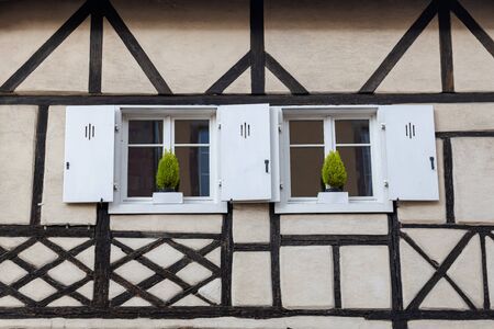 View with colorful buildings, traditional half timbered houses facadesの写真素材