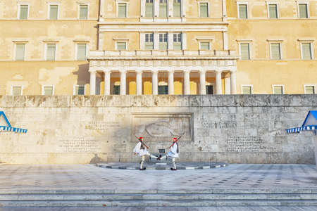Athens, Greece - November 3 2019: Changing of the Guard at the Tomb of the Unkonwn Soldier at the Hellenic Parliament on Syntagma Square. Soldiers Marching on Parade.のeditorial素材
