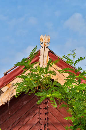 Beautiful wooden decoration on the traditional fronton house in Danube Delta regionの写真素材