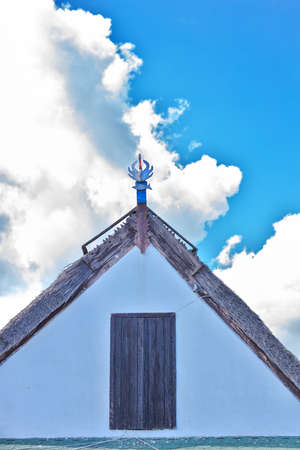 Beautiful wooden decoration on the traditional fronton house in Danube Delta regionの写真素材