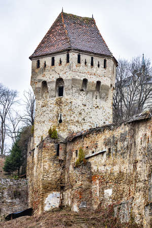 Defence wall and the Tinkers tower of Sighisoara citadel in Transylvania, Romaniaの写真素材