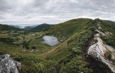Lake Nesamovite and the surrounding landscape, the black water of the lake in autumn, autumn in the...