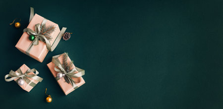 Banner with many gift boxes with paper decorations on turquoise background. Christmas background.の写真素材