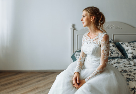 Young bride getting ready for wedding.の写真素材