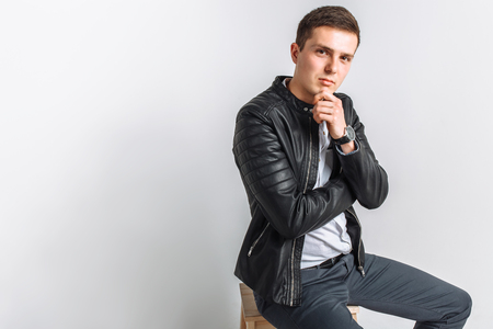 The guy in the Studio. The guy in the black jacket. Handsome guy. High quality photoの写真素材