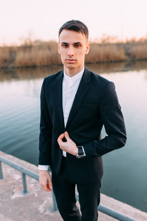 Beautiful man waiting for his beloved, Valentine's day, joy, lovely boyの写真素材