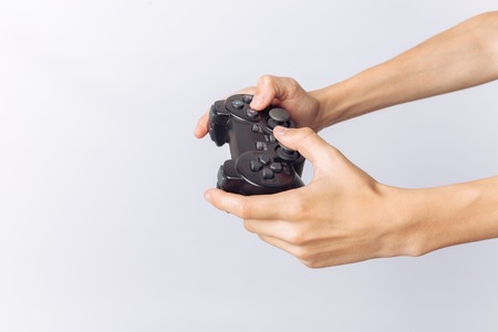 The image of hands that play games, stick, white background, insert text ,