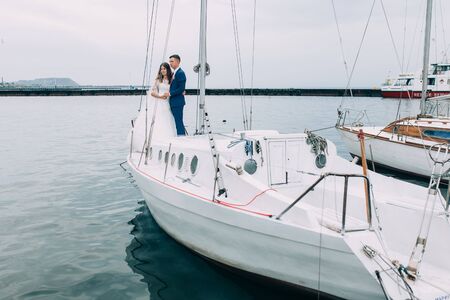 Wedding couple on a yachtの写真素材