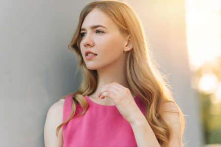 Young beautiful woman, in a summer dress, posing. Valentine's Day. Holiday for a woman. March 8....