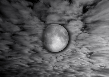 The moon in the night sky in clouds 3D illustrationの写真素材