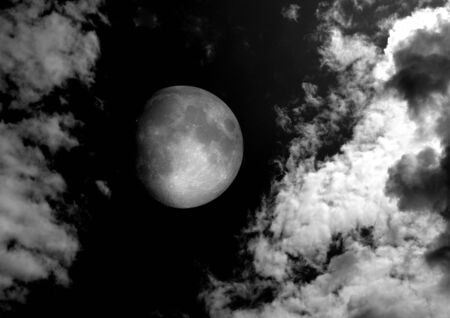 The moon in the night sky in clouds 3D illustrationの写真素材