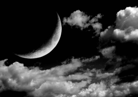 The moon in the night sky in clouds 3D illustrationの写真素材
