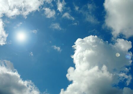 white clouds in a blue skyの写真素材