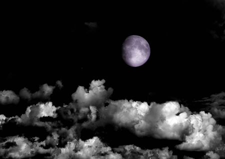 The moon in the night sky in clouds 3D illustrationの写真素材