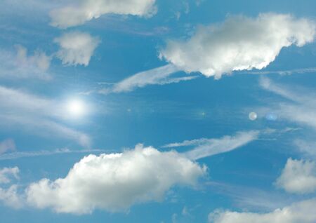 white clouds in a blue sky