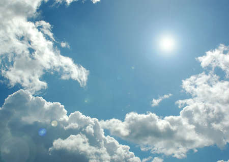 white clouds in a blue skyの写真素材