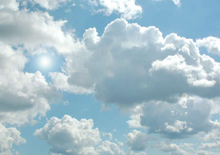 white clouds in a blue skyの写真素材