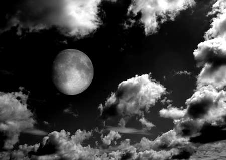 The moon in the night sky in clouds 3D illustrationの写真素材