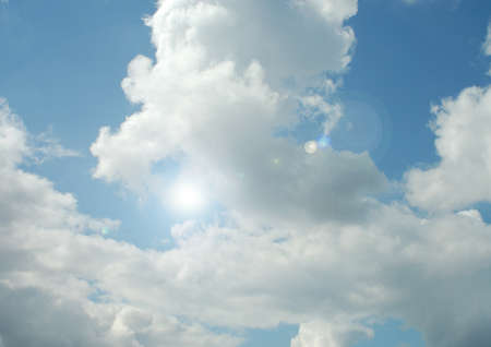 white clouds in a blue skyの写真素材