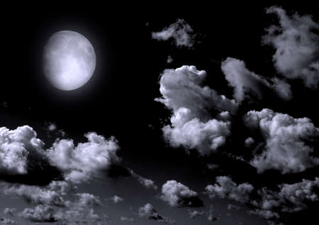 The moon in the night sky in clouds. 3D renderingの写真素材