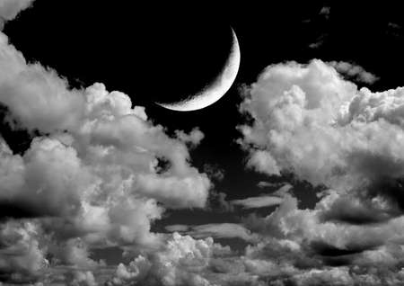 The moon in the night sky in clouds. 3D renderingの写真素材