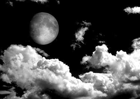 The moon in the night sky in clouds. 3D renderingの写真素材