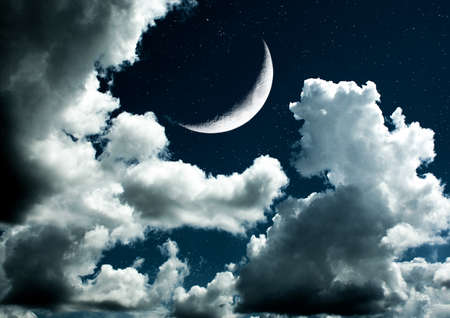 The moon in the night sky in clouds 3D illustrationの写真素材