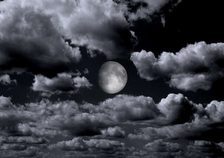 The moon in the night sky in clouds 3D illustrationの写真素材
