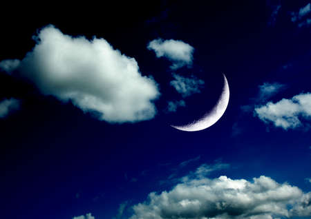 The moon in the night sky in clouds 3D illustrationの写真素材