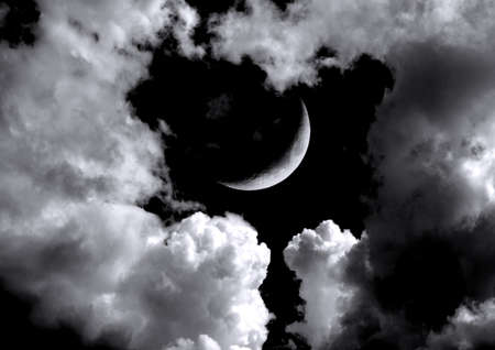 The moon in the night sky in clouds 3D illustrationの写真素材