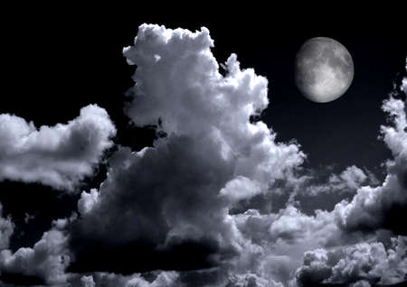 The moon in the night sky in clouds 3D illustrationの写真素材