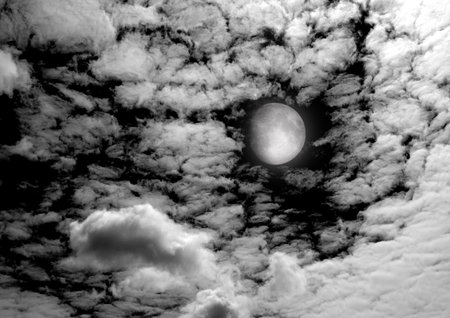The moon in the night sky in clouds 3D illustrationの写真素材