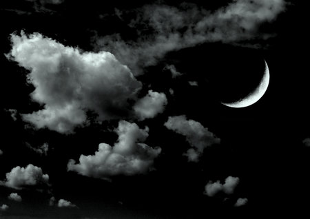 The moon in the night sky in clouds 3D illustrationの写真素材