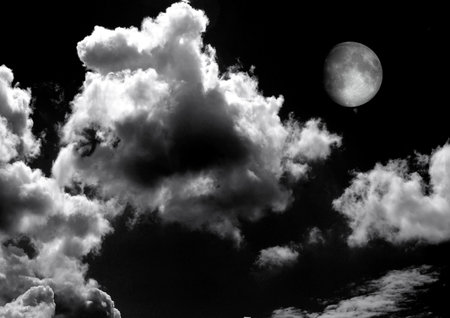 The moon in the night sky in clouds 3D illustrationの写真素材