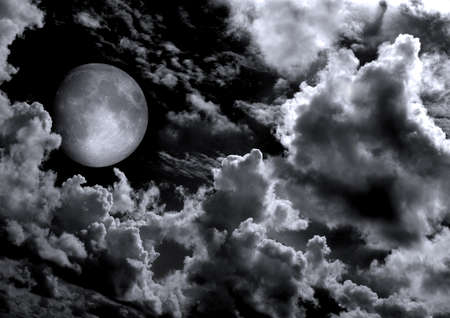The moon in the night sky in clouds 3D illustrationの写真素材