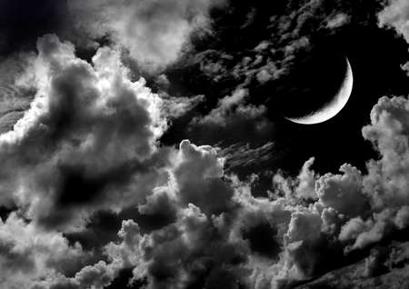 The moon in the night sky in clouds 3D illustrationの写真素材