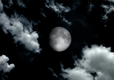 The moon in the night sky in clouds 3D illustrationの写真素材