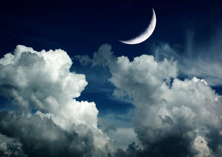 The moon in the night sky in clouds 3D illustrationの写真素材